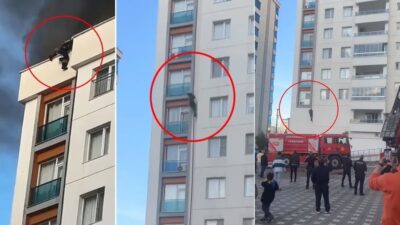 Diyarbakır'da 11 katlı binanın çatısında alevler arasında kalınca itfaiye hortumuna