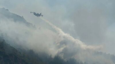 Muğla'nın Bodrum ilçesinde çıkan orman yangınına havadan ve karadan müdahale