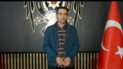 Hakkında "silahlı terör örgütüne üye olma" suçundan arama kararı bulunan